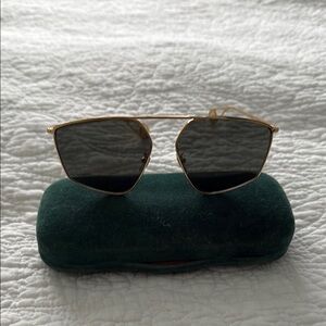 Guccis Gold Frame Sunglasses